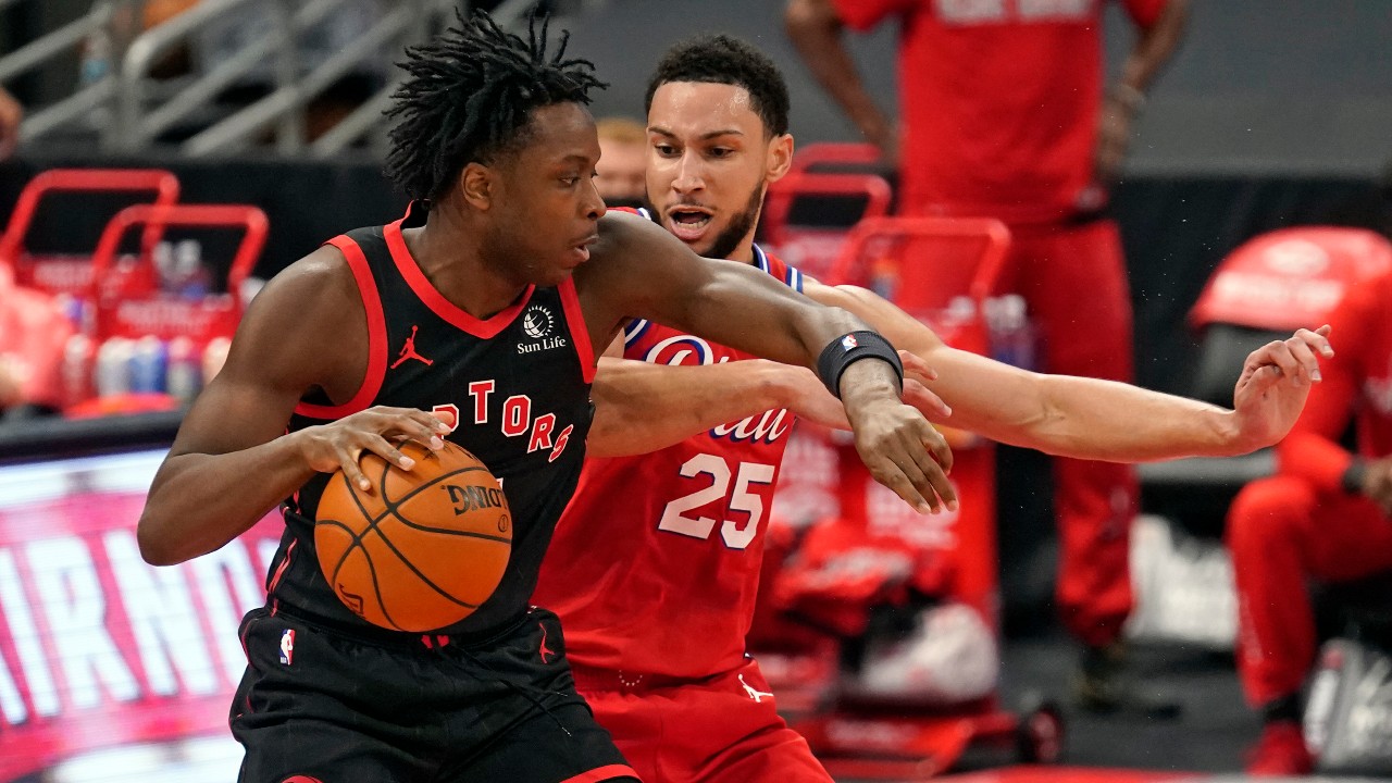 Toronto Raptors forward OG Anunoby (3) works against Philadelphia 76ers guard Ben Simmons (25) during the first half of an NBA basketball game. (Chris O'Meara/AP)