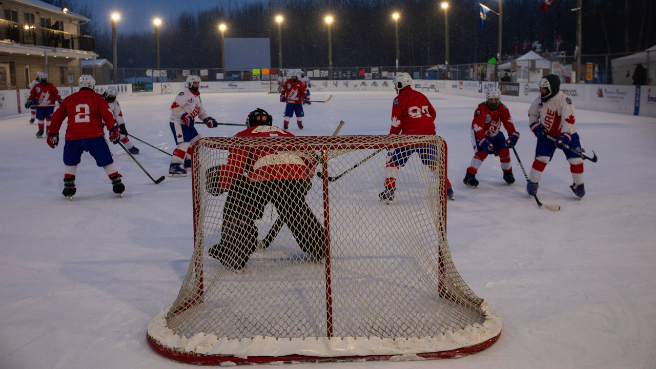 Players take part in the World's Longest Hockey Game near Edmonton. (Jason Franson/CP)