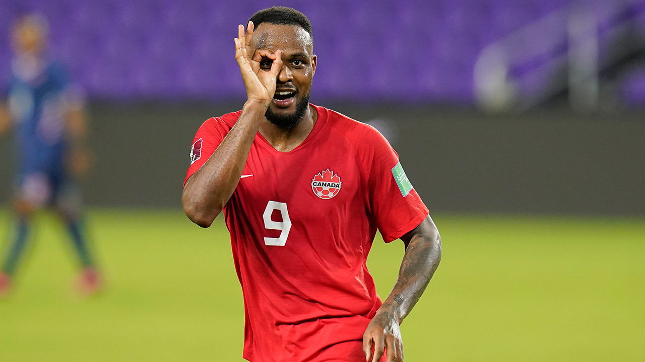 Canada forward Cyle Larin (9) gestures after scoring his third goal against Bermuda during the second half of a World Cup 2022 Group B qualifying soccer match. (AP Photo/John Raoux)