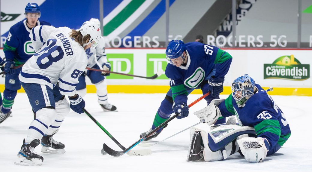 Canucks come back to beat Maple Leafs in second co