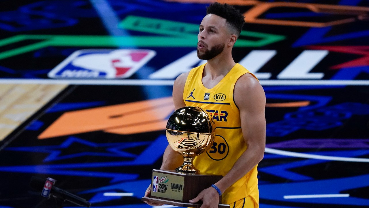 Golden State Warriors' Stephen Curry holds his All-Star game