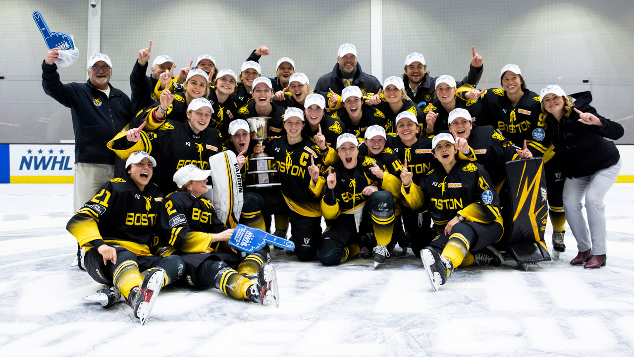 The Boston Pride gather for a photo with the NWHL's Isobel Cup after beating the Minnesota Whitecaps. (Michelle Jay/NWHL)