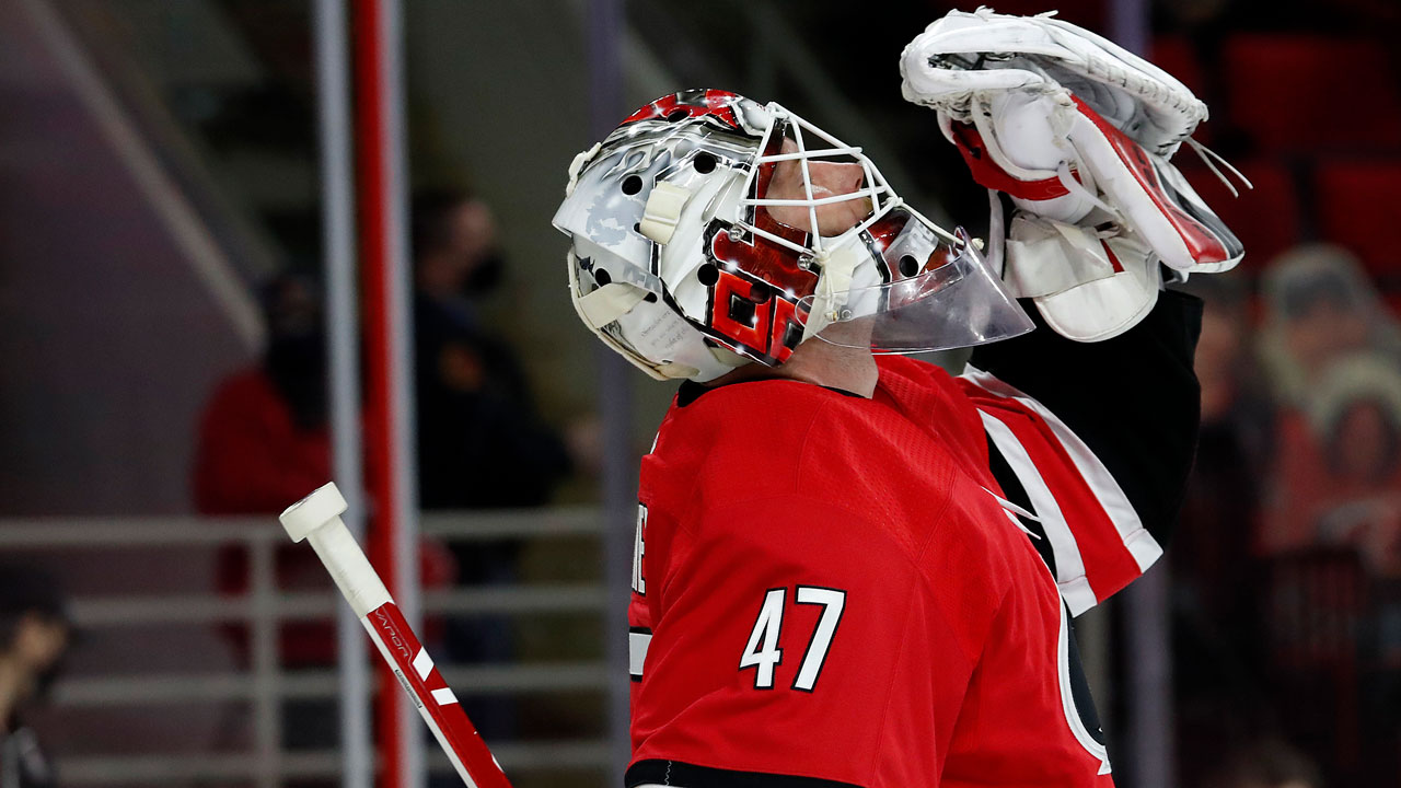 Carolina Hurricanes goaltender James Reimer (47) celebrates his win following the third period of an NHL hockey game against the Florida Panthers. (Karl B DeBlaker/AP)