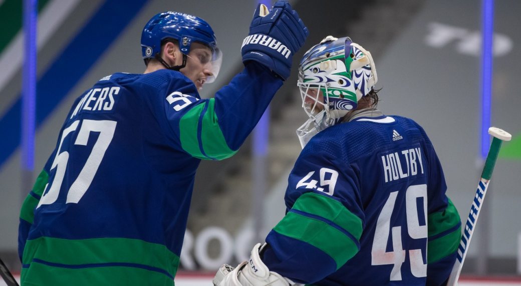 Canucks keep pressure on in playoff race as Holtby