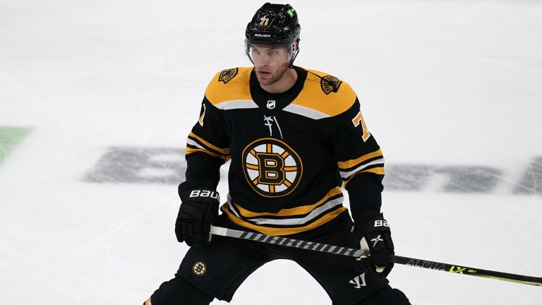 Boston Bruins left wing Taylor Hall stretches during warmups for the team's NHL hockey game, Tuesday, April 13, 2021, in Boston. (Charles Krupa/AP)