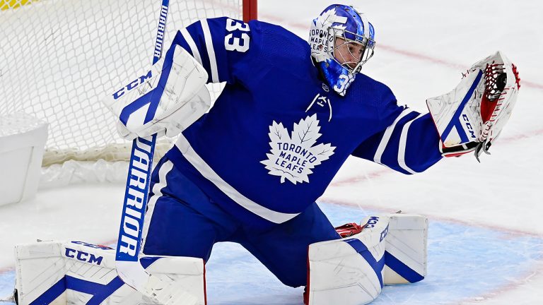 Toronto Maple Leafs goaltender David Rittich (33) makes a save against the Calgary Flames during second period NHL hockey action in Toronto on Tuesday, April 13, 2021. (Frank Gunn/CP)