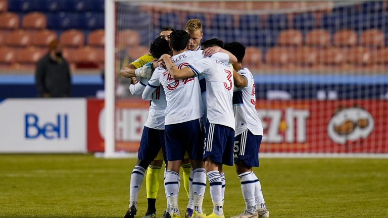 Vancouver Whitecaps players celebrate their victory over the Portland Timbers following their MLS soccer game, Sunday, April 18, 2021, in Sandy, Utah. (Rick Bowmer/AP)