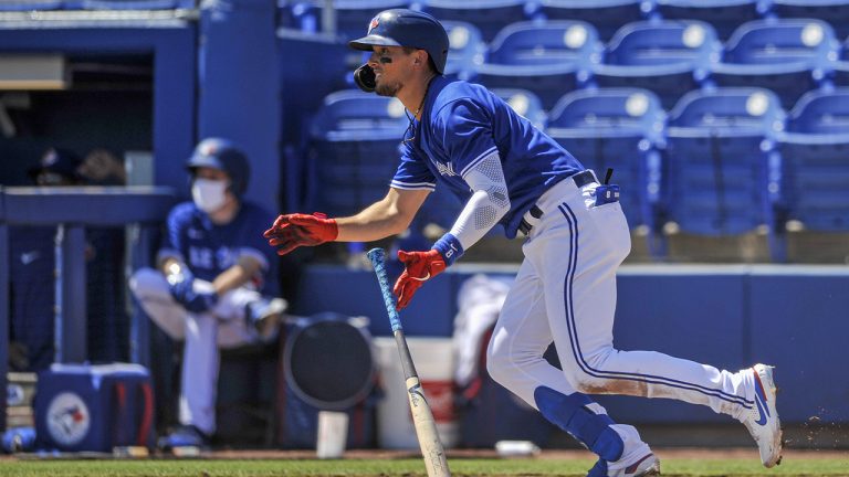 Toronto Blue Jays' Cavan Biggio watches his fly ball to centre field during the fourth inning of a baseball game at TD Ballpark in Dunedin, Fla. (Steve Nesius/CP)