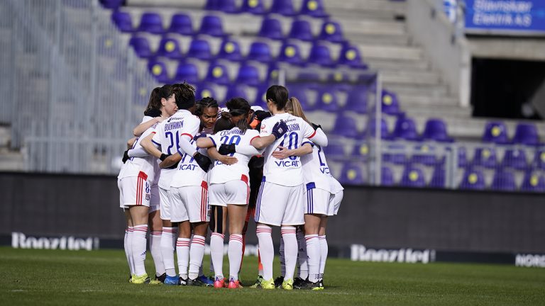 Olympique Lyon team gather before the start of their Women's Champions League last 16 soccer match against Broendby IF. (Liselotte Sabroe/Ritzau via AP)