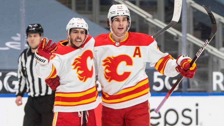 Calgary Flames stars Johnny Gaudreau (13) and Sean Monahan (23) celebrate a goal. (Jason Franson/CP)