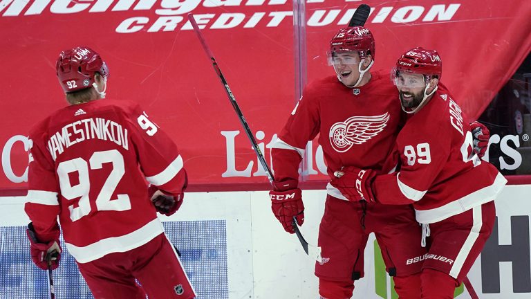 Detroit Red Wings forward Jakub Vrana, second from right, is greeted by centers Sam Gagner (89) and Vladislav Namestnikov (92) after a goal during the second period against the Chicago Blackhawks, April 15, 2021. (Carlos Osorio/AP)