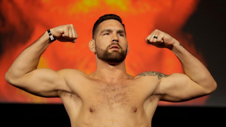 Chris Weidman poses for photographers during the weigh-ins ahead of his mixed martial arts middleweight bout against Ronaldo Souza at UFC 230, Friday, Nov. 2, 2018, at Madison Square Garden in New York. (Julio Cortez/AP)
