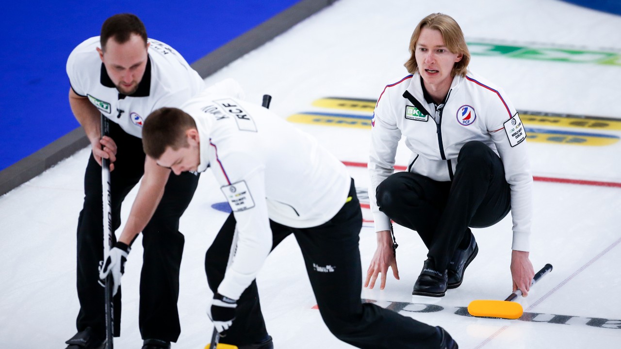 Russia skip Sergey Glukhov, right, directs his teammates against Team Canada at the Men's World Curling Championships in Calgary, Alta., Wednesday, April 7, 2021.THE CANADIAN PRESS/Jeff McIntosh