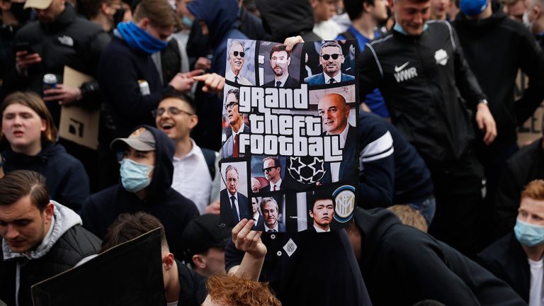 Chelsea fans protest outside Stamford Bridge stadium in London, against Chelsea's decision to be included amongst the clubs attempting to form a new European Super League, Tuesday, April 20, 2021. (Matt Dunham/AP)