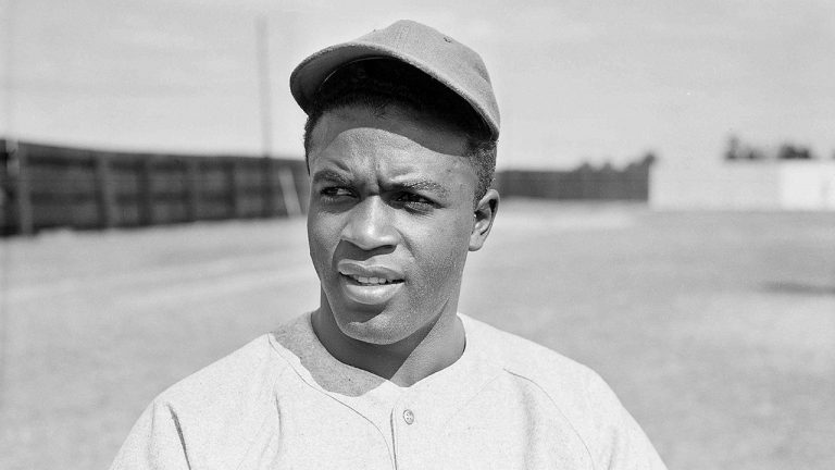 Jackie Robinson of the Montreal Royals poses for a photo in Sanford, Fla., on March 4, 1946. (AP Photo/Bill Chaplis, File)