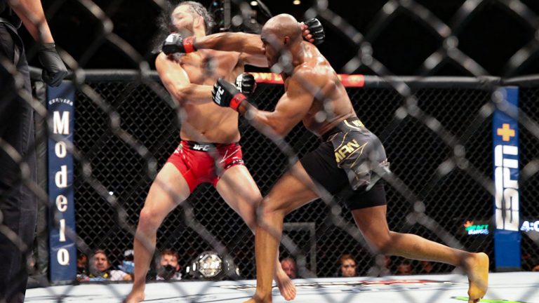 Kamaru Usman knocks out Jorge Masvidal at UFC 261 in Jacksonville, Fla. (Gary McCullough/AP)