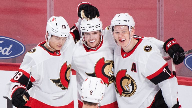 Ottawa Senators' Drake Batherson (19) celebrates with teammates Josh Norris (9) Tim Stutzle (18) and Brady Tkachuk (7) after scoring against the Montreal Canadiens during third period NHL hockey action in Montreal, Saturday, April 17, 2021. (Graham Hughes/CP)