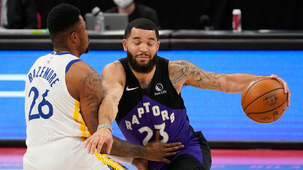 Toronto Raptors guard Fred VanVleet (23) crashes into Golden State Warriors forward Kent Bazemore (26) during the first half of an NBA basketball game Friday, April 2, 2021, in Tampa, Fla. (AP Photo/Chris O'Meara)