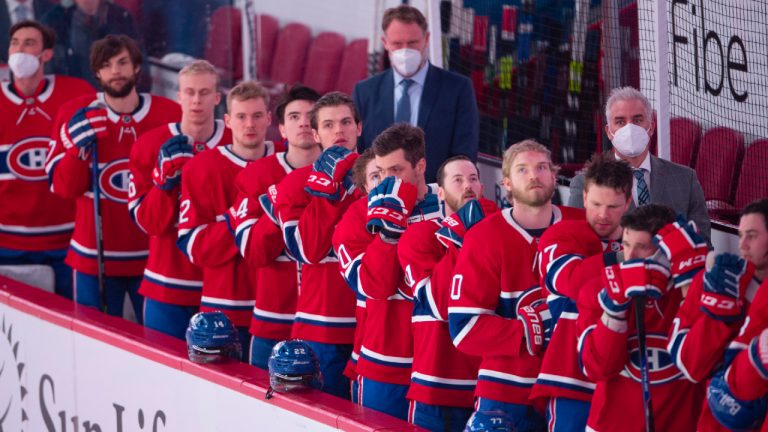 Montreal Canadiens stand for the national anthem before their final game of the season against the Edmonton Oilers in NHL hockey action Wednesday, May 12, 2021 in Montreal. The team has been criticized for not having enough Quebec born players in the lineup. (THE CANADIAN PRESS/Ryan Remiorz)