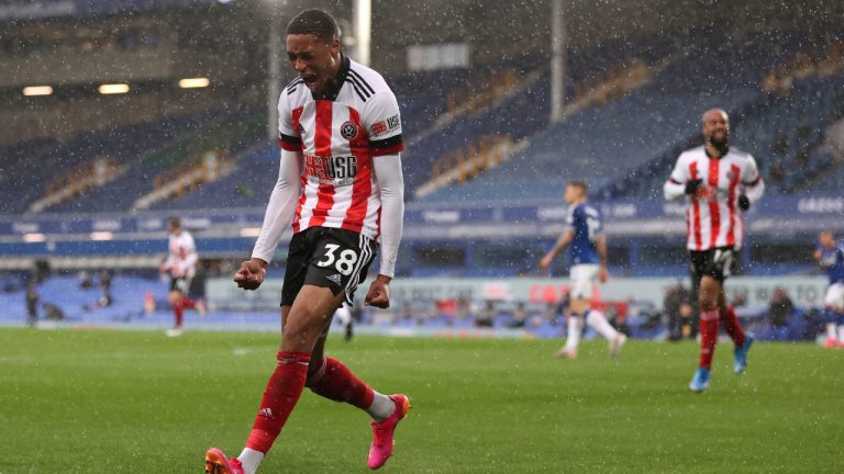 Sheffield United's Daniel Jebbison celebrates after scoring his side's opening goal during the English Premier League soccer match between Everton and Sheffield United at Goodison Park in Liverpool, England, Sunday, May 16, 2021. (Alex Pantling/AP)