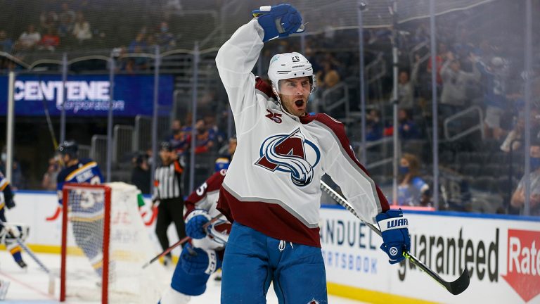 Colorado Avalanche's Brandon Saad (20) celebrates his goal against the St. Louis Blues during the third period in Game 3 of an NHL hockey Stanley Cup first-round playoff series Friday, May 21, 2021, in St. Louis. (Scott Kane/AP)