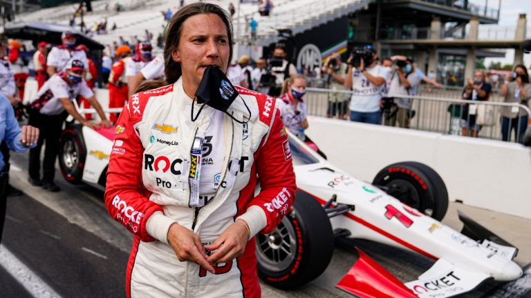 Simona de Silvestro, of Switzerland, stand next to her car after failing to break into a guaranteed spot in the race during qualifications for the Indianapolis 500 auto race at Indianapolis Motor Speedway in Indianapolis, Saturday, May 22, 2021. (AP Photo/Michael Conroy) 