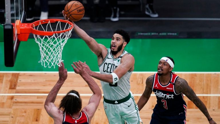 Boston Celtics forward Jayson Tatum drives to the basket during the Eastern Conference play-in game on May 18, 2021. (Charles Krupa/AP)