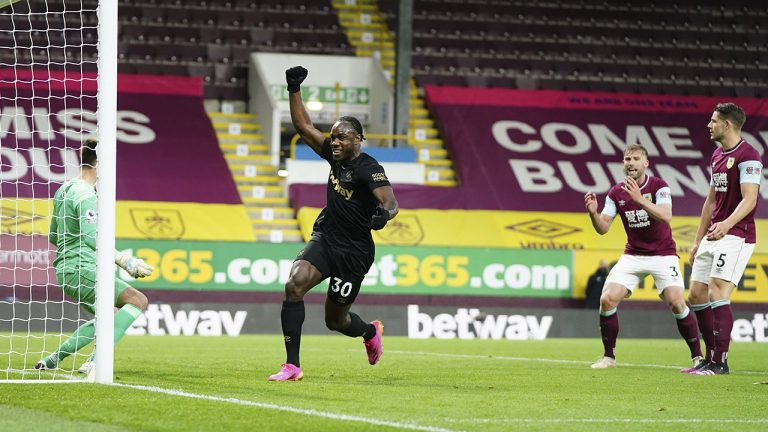 West Ham's Michail Antonio celebrates after scoring his side 2nd goal of the game during the English Premier League soccer match between Burnley and West Ham United. Monday, May 3, 2021. (Jon Super/AP)