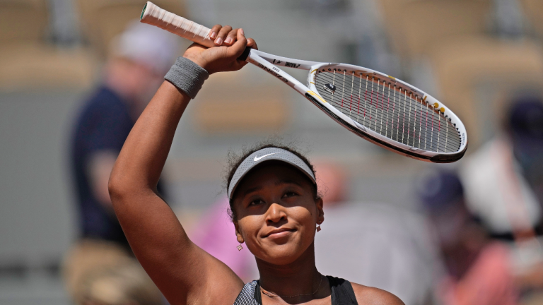 Japan's Naomi Osaka celebrates after defeating Romania's Patricia Maria Tig during their first round match of the French open tennis tournament at the Roland Garros stadium Sunday, May 30, 2021 in Paris. (Christophe Ena / AP) 