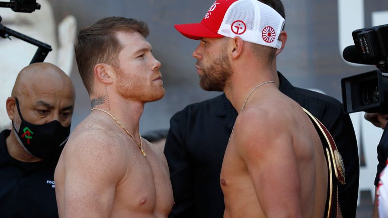 Saul "Canelo" Alvarez, front left, and Billy Joe Saunders, right, pose for a face off after their weigh-ins in Arlington, Texas. (Roger Steinman/AP)