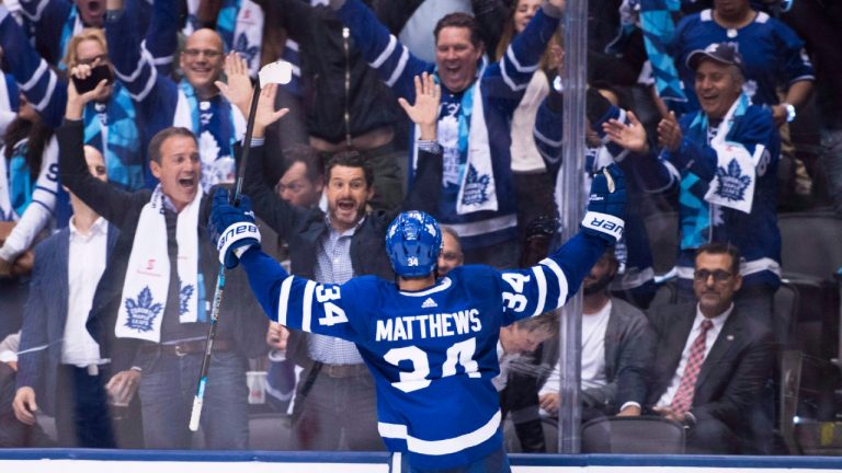 Toronto Maple Leafs centre Auston Matthews (34) celebrates a game winning goal with fans. (Nathan Denette/CP)