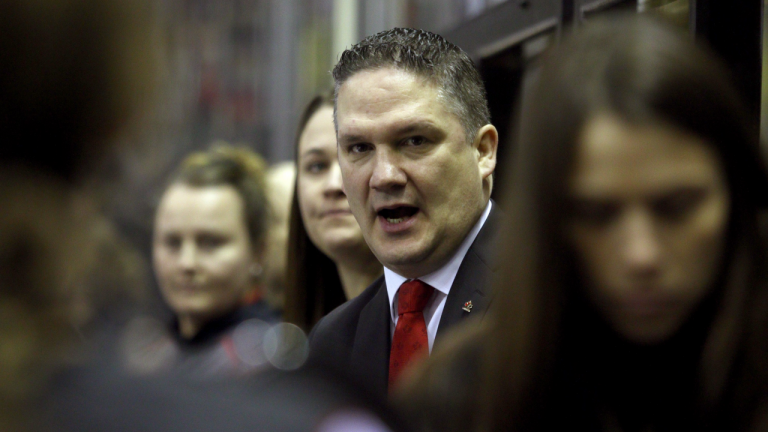 Team Canada's head coach Troy Ryan talks with players before the start of the of the Rivalry Series at the Save-On-Foods Memorial Centre in Victoria, B.C., on Monday, February 3, 2020. (Chad Hipolito / CP)