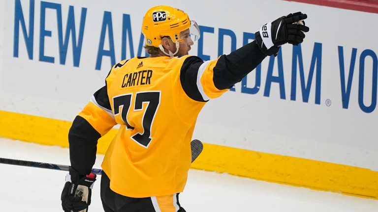 Pittsburgh Penguins' Jeff Carter celebrates his goal in the first period in Game 2 of an NHL hockey Stanley Cup first-round playoff series against the New York Islanders in Pittsburgh, Tuesday, May 18, 2021. (Gene J. Puskar/AP)