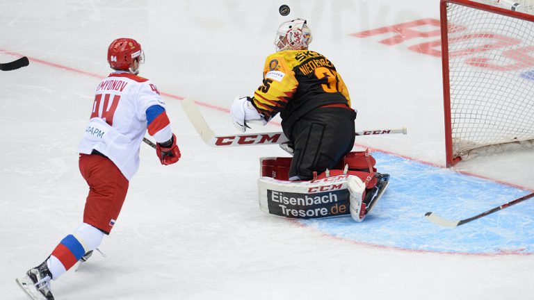 Russia's Kirill Semyonov scores past Germany's goalie Mathias Niederberger during a Euro Ice Hockey Challenge match between Russia and Germany in Sochi, Russia, Friday, April 6, 2018. (Artur Lebedev/AP)