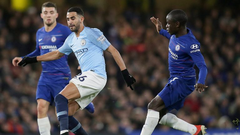 Manchester City's Riyad Mahrez, centre, goes for the ball past Chelsea's Ngolo Kante, right, and Chelsea's Mateo Kovacic, background, during a Premier League match between Chelsea and Manchester City at Stamford Bridge in London, Saturday Dec. 8, 2018. (Tim Ireland/AP) 