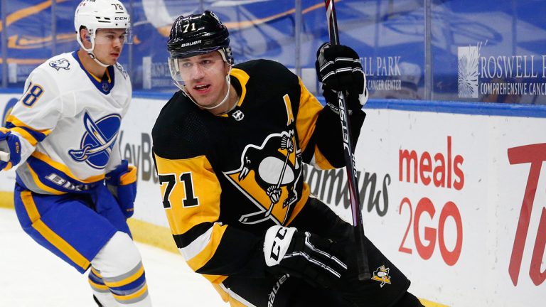 Pittsburgh Penguins forward Evgeni Malkin (71) celebrates his goal during the first period of an NHL hockey game against the Buffalo Sabres, Thursday, March 11, 2021, in Buffalo, N.Y. (Jeffrey T. Barnes/AP)