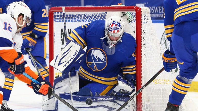 Buffalo Sabres goalie Michael Houser (32) makes a save in traffic . (Jeffrey T. Barnes/AP)