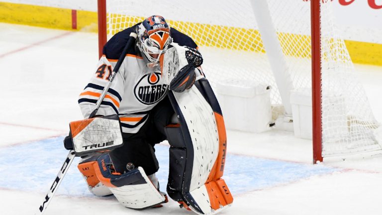 Edmonton Oilers goaltender Mike Smith (41) sits on the ice after allowing the game-winning goal during third overtime period NHL Stanley Cup playoff action against the Winnipeg Jets, in Winnipeg on Tuesday, May 25, 2021. (Fred Greenslade/CP)