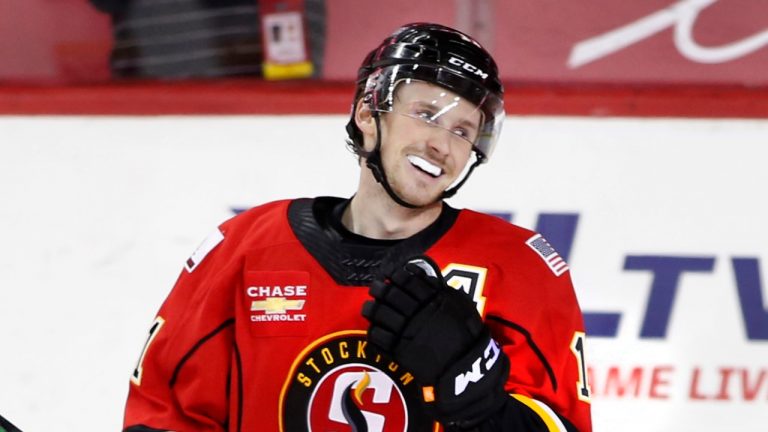 Stockton Heat player Matthew Phillips celebrates his goal against the Belleville Senators during AHL (American Hockey League) hockey action in Calgary, Alta., on Wednesday, Apr. 14, 2021. (Larry MacDougal/CP)