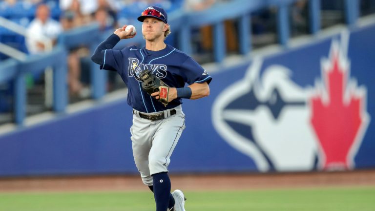 Tampa Bay Rays shortstop Taylor Walls throws out Toronto Blue Jays' Randal Grichuk during the first inning of a baseball game Saturday, May 22, 2021, in Dunedin, Fla. (Mike Carlson/AP)
