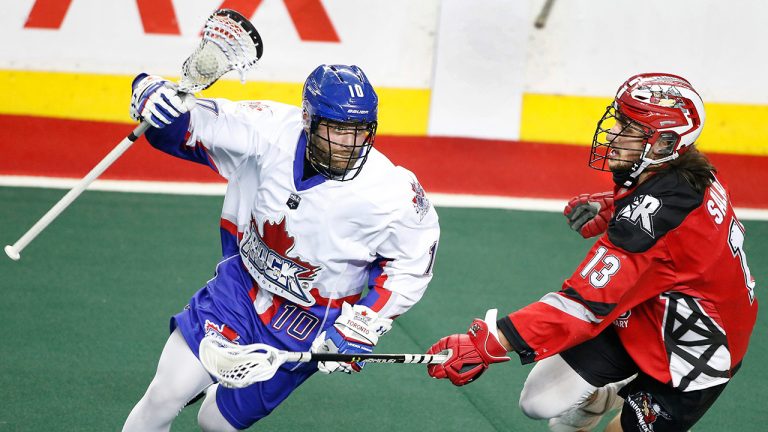 National Lacross League profile photo on Toronto Rock player Rob Hellyer playing against Calgary Roughnecks player Eli Salama during a game in Calgary, Alta., on Sat., March 9, 2019. (Larry MacDougal/CP)