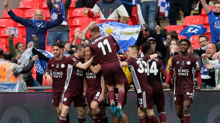 Leicester's Youri Tielemans, centre, celebrates after scoring the opening goal during the FA Cup final between Chelsea and Leicester City at Wembley Stadium in London, England, Saturday May 15, 2021. (Kirsty Wigglesworth/AP)