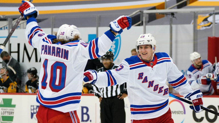 New York Rangers' Adam Fox (23) celebrates his goal during the second period of an NHL hockey game against the Pittsburgh Penguins in Pittsburgh, Friday, Jan. 22, 2021. (Gene J. Puskar / AP) 