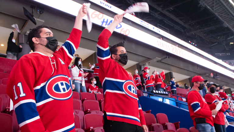 Montreal Canadiens fans are shown prior to NHL Stanley Cup playoff hockey action against the Toronto Maple Leafs in Montreal, Saturday, May 29, 2021. (Graham Hughes / CP)