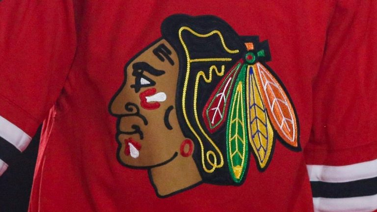 The Chicago Blackhawks logo is shown on a team jersey. (Amr Alfiky/AP)