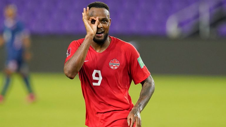 Canada forward Cyle Larin (9) gestures after scoring a goal. (John Raoux/AP) 