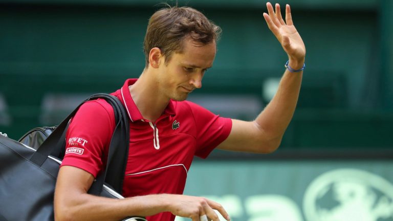 Russia's Daniil Medvedev waves after he lost his ATP Tour Singles, Men, 1st Round tennis match against Germany's Jan-Lennard Struff in Halle, Germany, Tuesday, June 15, 2021. (Friso Gentsch/dpa via AP)