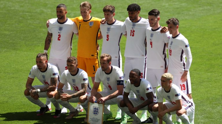 England players pose for a team photo ahead of the Euro 2020 soccer championship group D match against Croatia. (Catherine Ivill, Pool via AP)