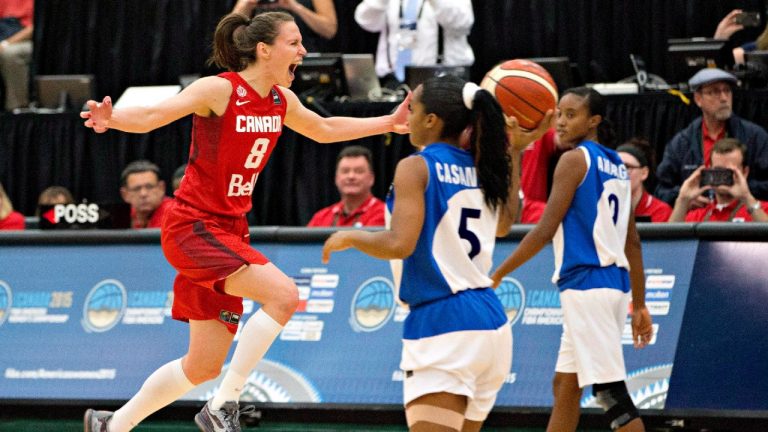 Canada's Kim Gaucher, left, celebrates the team's win over Cuba. (Jason Franson/CP