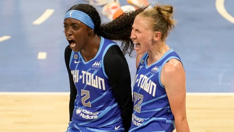 Chicago Sky's Kahleah Copper (2) celebrates with Courtney Vandersloot after Vandersloot was fouled and scored in the act of shooting during the second half of a WNBA basketball game against the Connecticut Sun Thursday, June 17, 2021, in Chicago. The Sky won 81-75. (Charles Rex Arbogast/AP)